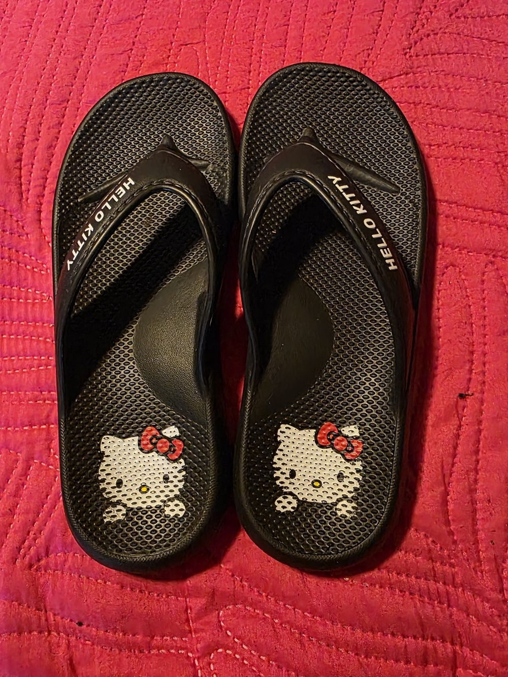 Hello Kitty Black Slip-On Sandals with Red Bow Detail